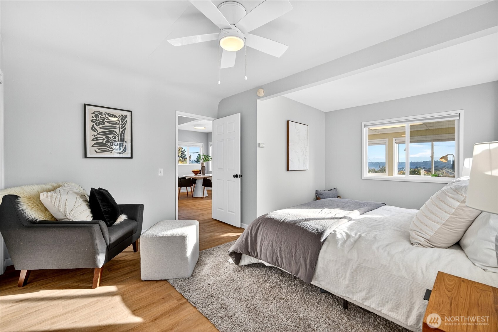 3846 35th Avenue Southwest Seattle, WA 98126 - Photo 24 of 40 a bedroom with a bed and wooden floor