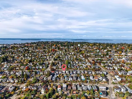 an aerial view of houses with outdoor space