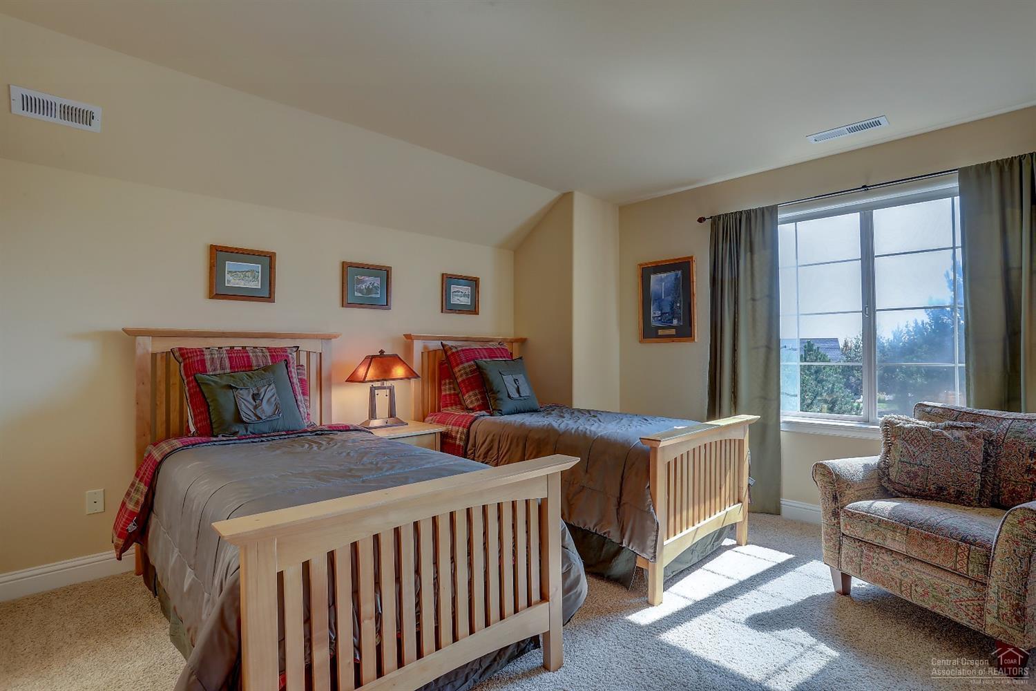 8915 Merlin Drive Redmond, OR 97756 - Photo 13 of 25 Bedroom with connecting bath