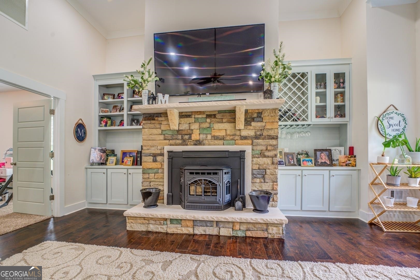 3060 Eatonton Road Madison, GA 30650 - Photo 6 of 65 a living room with furniture and a fireplace