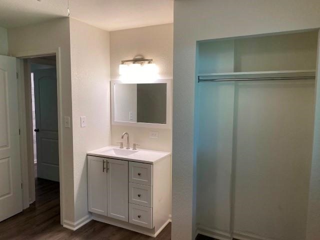 7838 Nimitz Road Millington, TN 38053 - Photo 11 of 14 Bathroom featuring vanity and hardwood / wood-style flooring