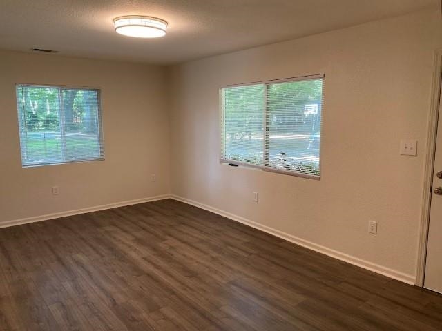 7838 Nimitz Road Millington, TN 38053 - Photo 5 of 14 Unfurnished room featuring dark hardwood / wood-style flooring