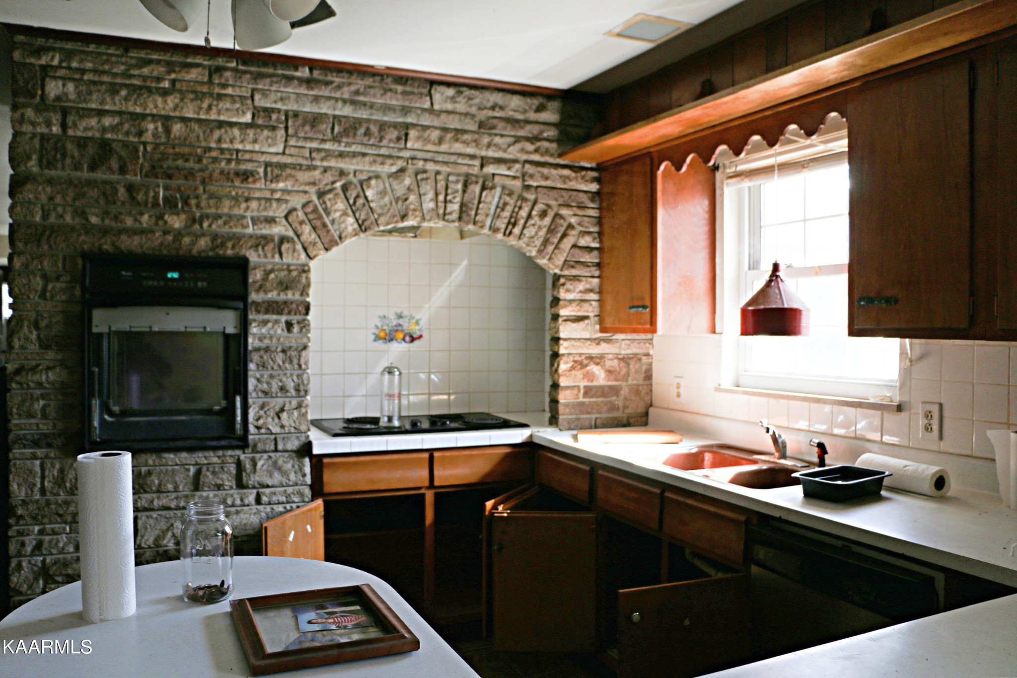 4014 Indian Ridge Road Blaine, TN 37709 - Photo 13 of 27 a kitchen with a sink and a stove