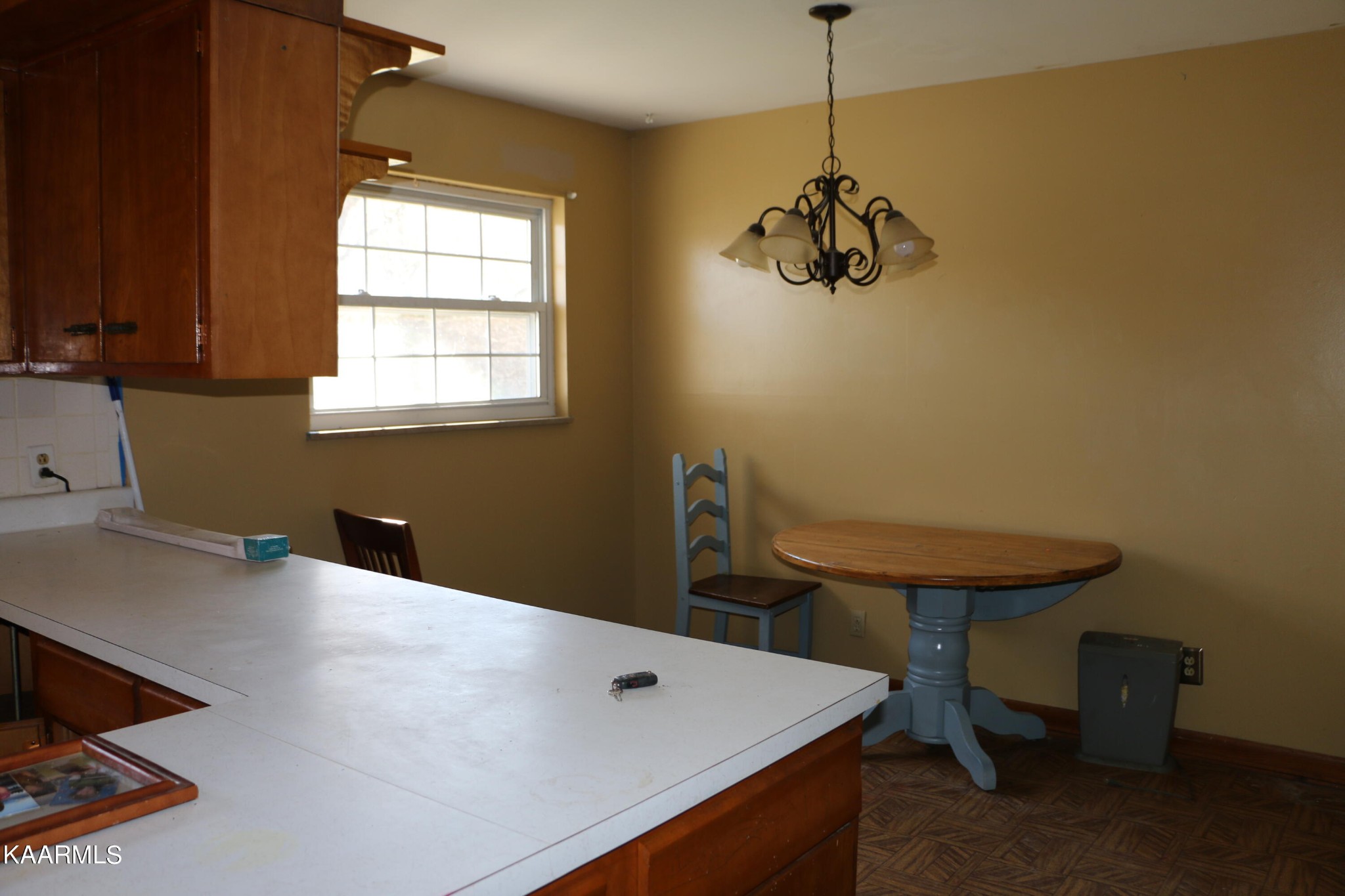 4014 Indian Ridge Road Blaine, TN 37709 - Photo 14 of 27 a room with a table chairs and wooden floor