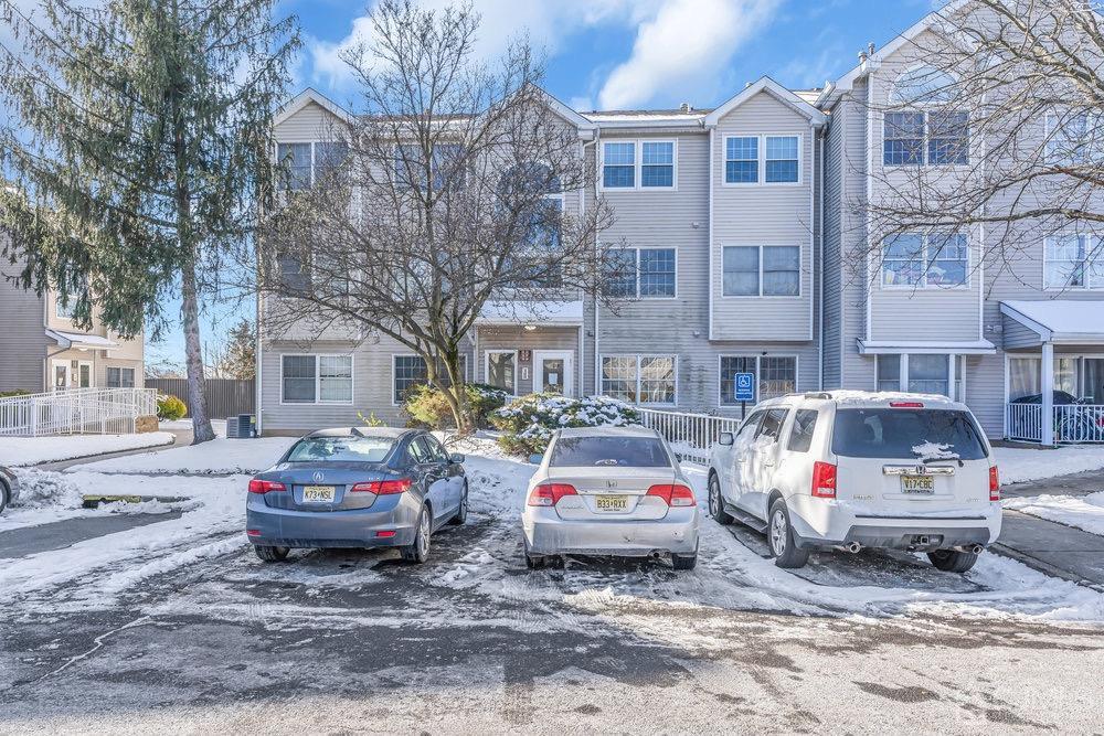1236 Edpas Road New Brunswick, NJ 08901 - Photo 1 of 26 a white car parked in front of a brick house