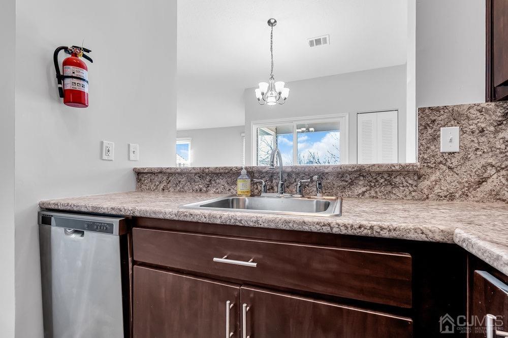 1236 Edpas Road New Brunswick, NJ 08901 - Photo 11 of 26 a kitchen with a sink and a wooden floor