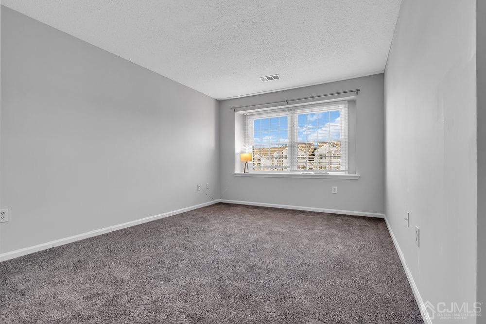 1236 Edpas Road New Brunswick, NJ 08901 - Photo 15 of 26 an empty room with windows