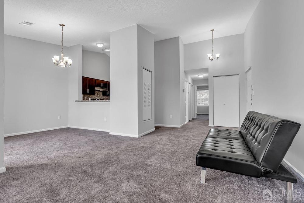 1236 Edpas Road New Brunswick, NJ 08901 - Photo 7 of 26 a living room with furniture and a flat screen tv
