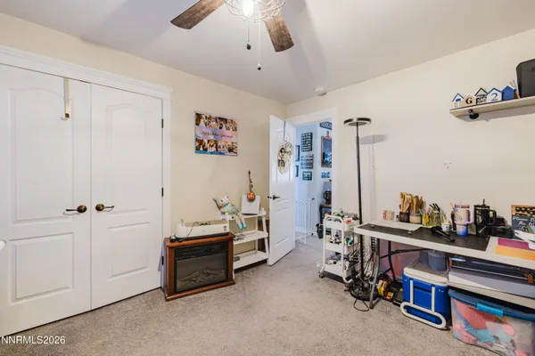 a room with furniture and air hockey table