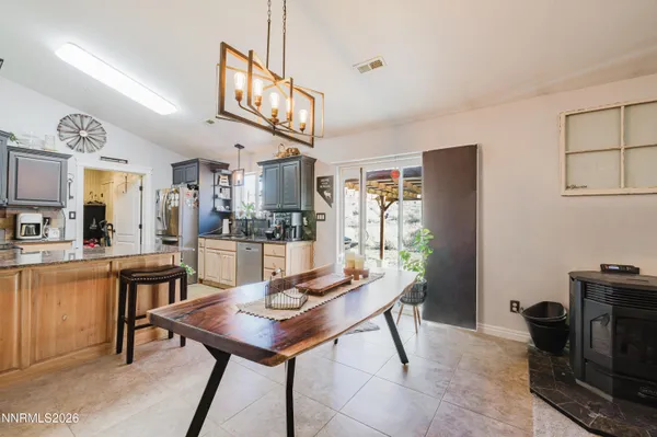 a view of a dining room with furniture