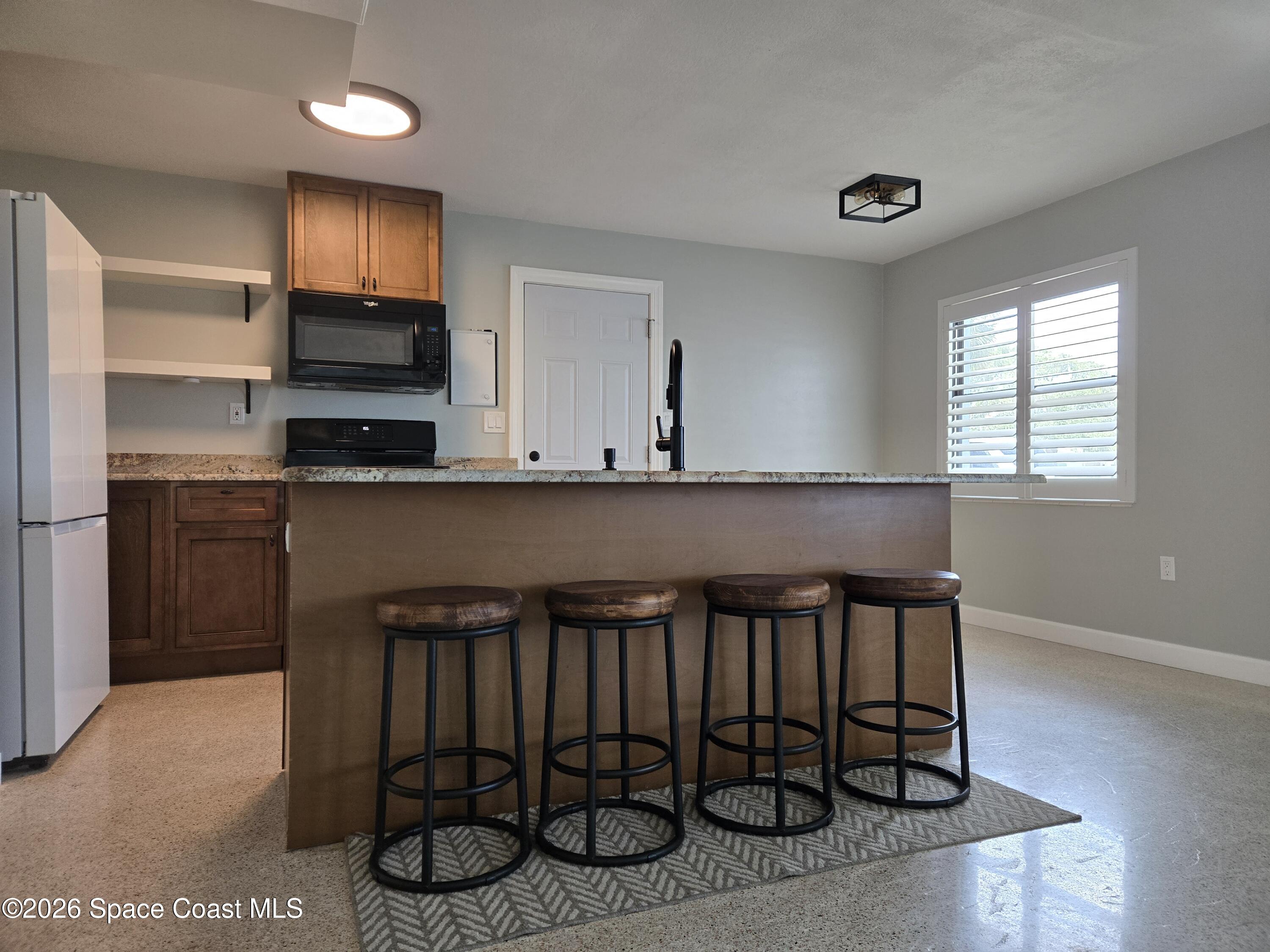 550 Capri Road Cocoa Beach, FL 32931 - Photo 12 of 28 20260602_135559