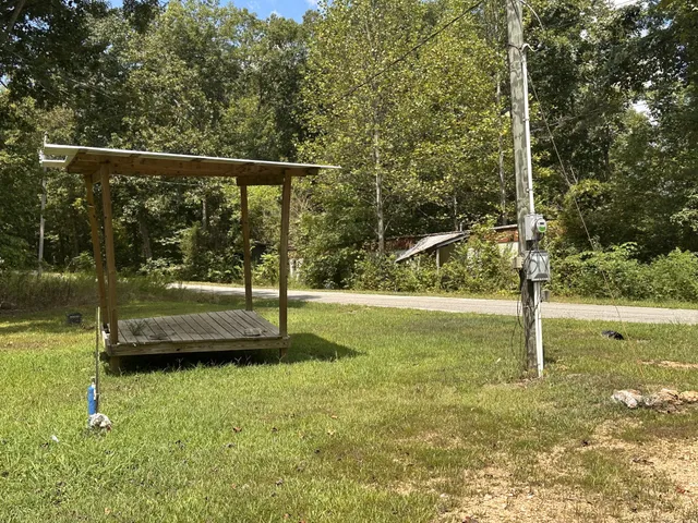 a backyard of a house with lots of green space
