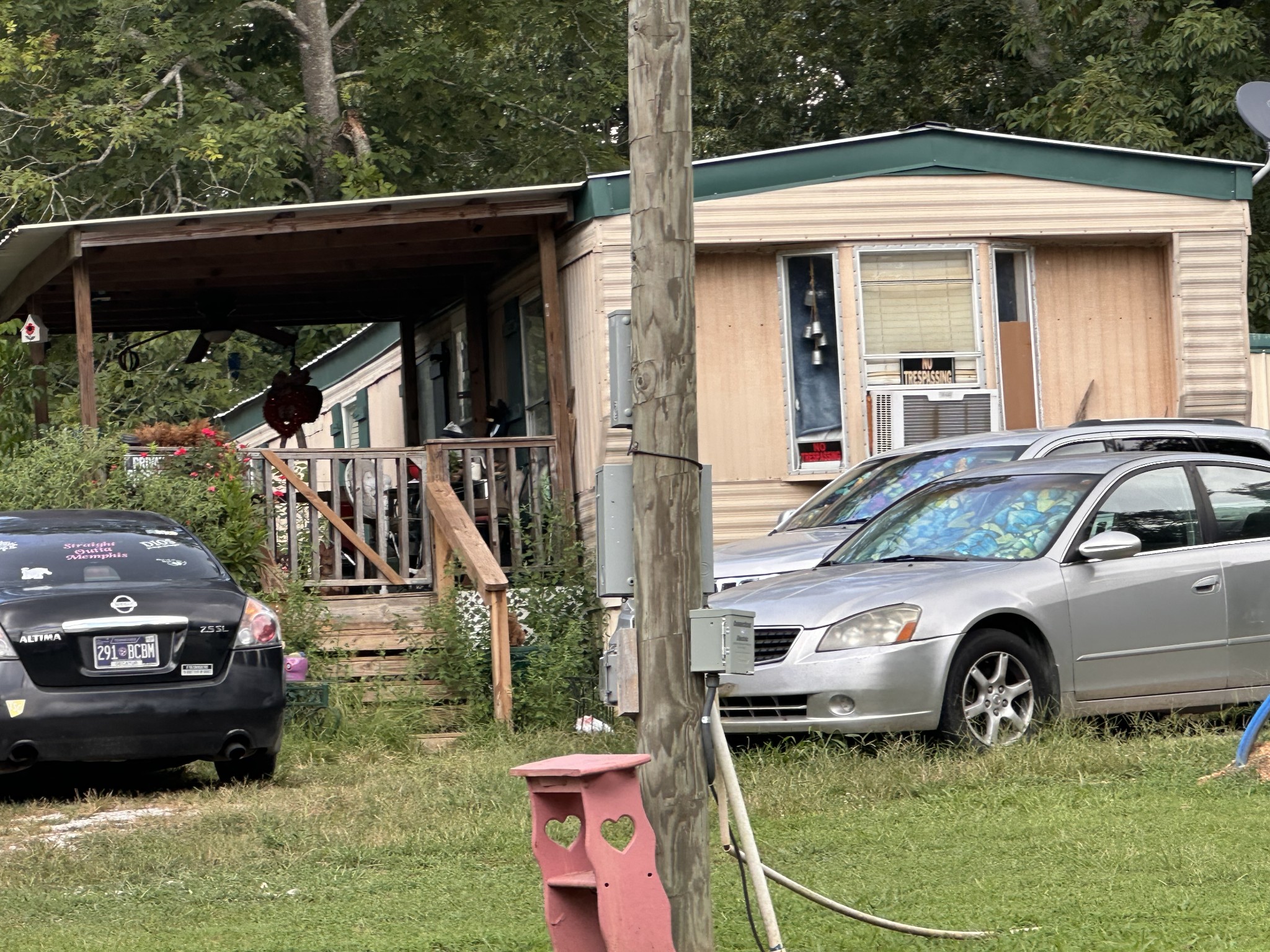 84 Perryville Estate Lane Parsons, TN 38363 - Photo 4 of 16 a car parked in front of a house