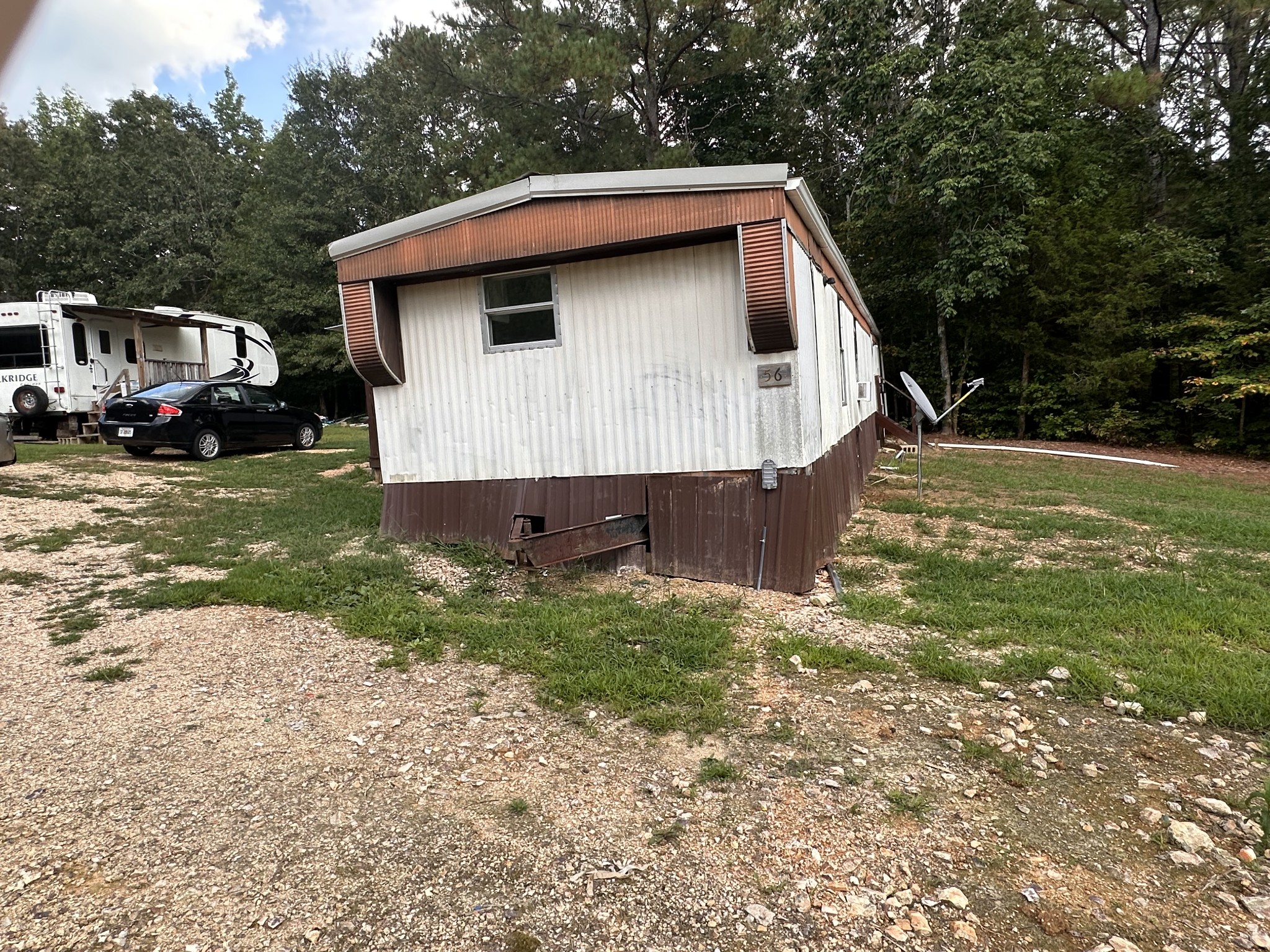 84 Perryville Estate Lane Parsons, TN 38363 - Photo 7 of 16 a view of a small house in the background