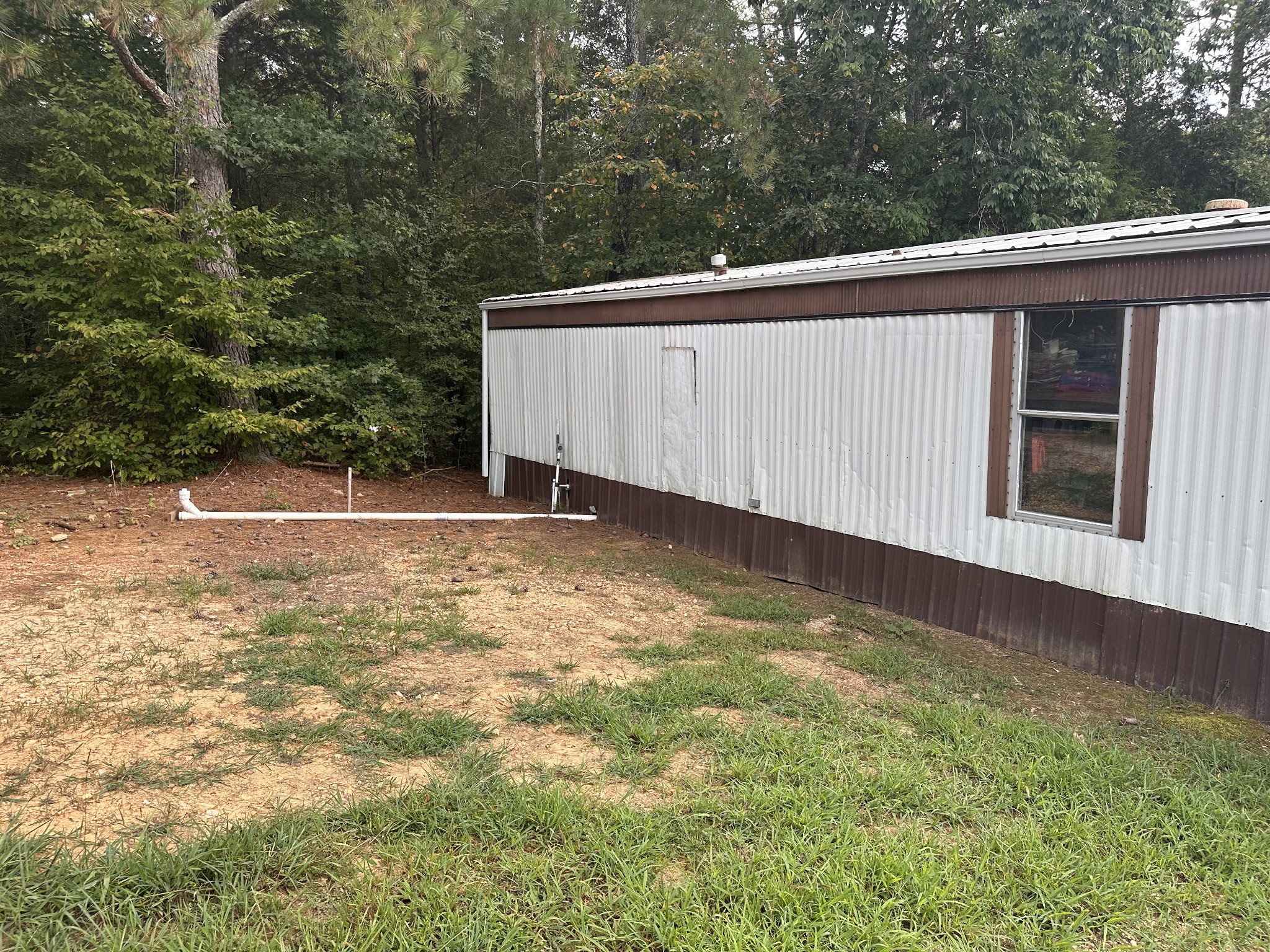 84 Perryville Estate Lane Parsons, TN 38363 - Photo 8 of 16 a view of a back yard