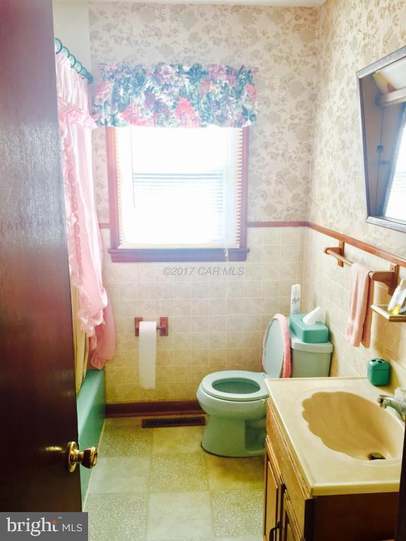 10817 Toddville Road Chance, MD 21821 - Photo 15 of 21 a bathroom with a sink and toilet