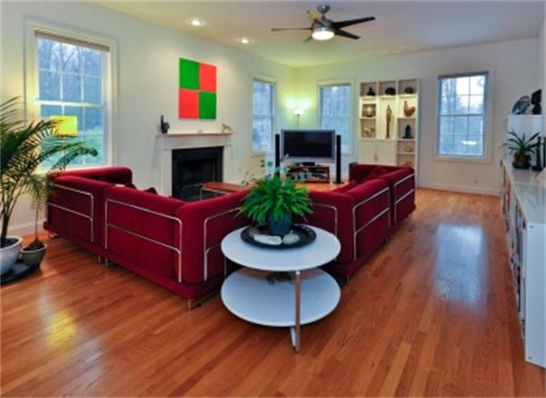 5 Squirrel Hill Road Acton, MA 01720 - Photo 15 of 30 a living room with furniture and a fireplace