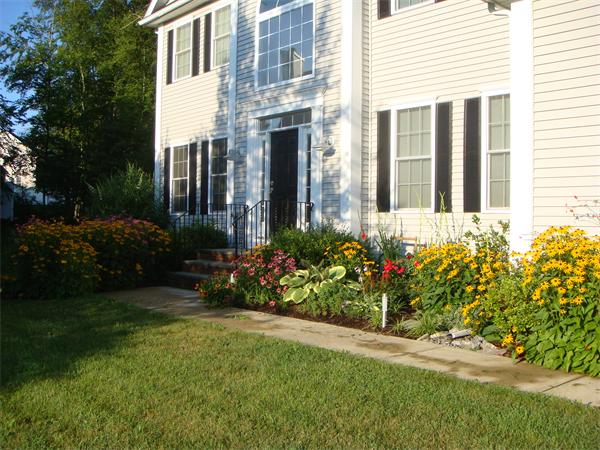5 Squirrel Hill Road Acton, MA 01720 - Photo 2 of 30 a view of a potted plant in front of a house