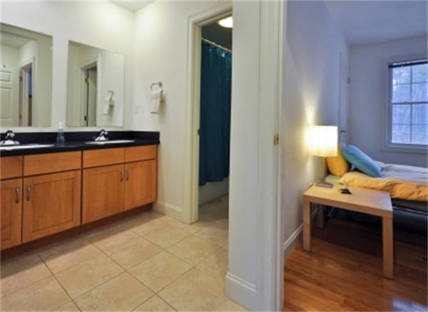 5 Squirrel Hill Road Acton, MA 01720 - Photo 28 of 30 a room with sink and mirror