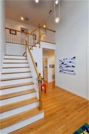 5 Squirrel Hill Road Acton, MA 01720 - Photo 3 of 30 a view of entryway and hall with wooden floor