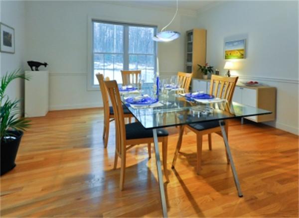 5 Squirrel Hill Road Acton, MA 01720 - Photo 8 of 30 a view of a dining room with furniture and wooden floor