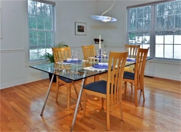 5 Squirrel Hill Road Acton, MA 01720 - Photo 9 of 30 a view of a dining room with furniture and wooden floor