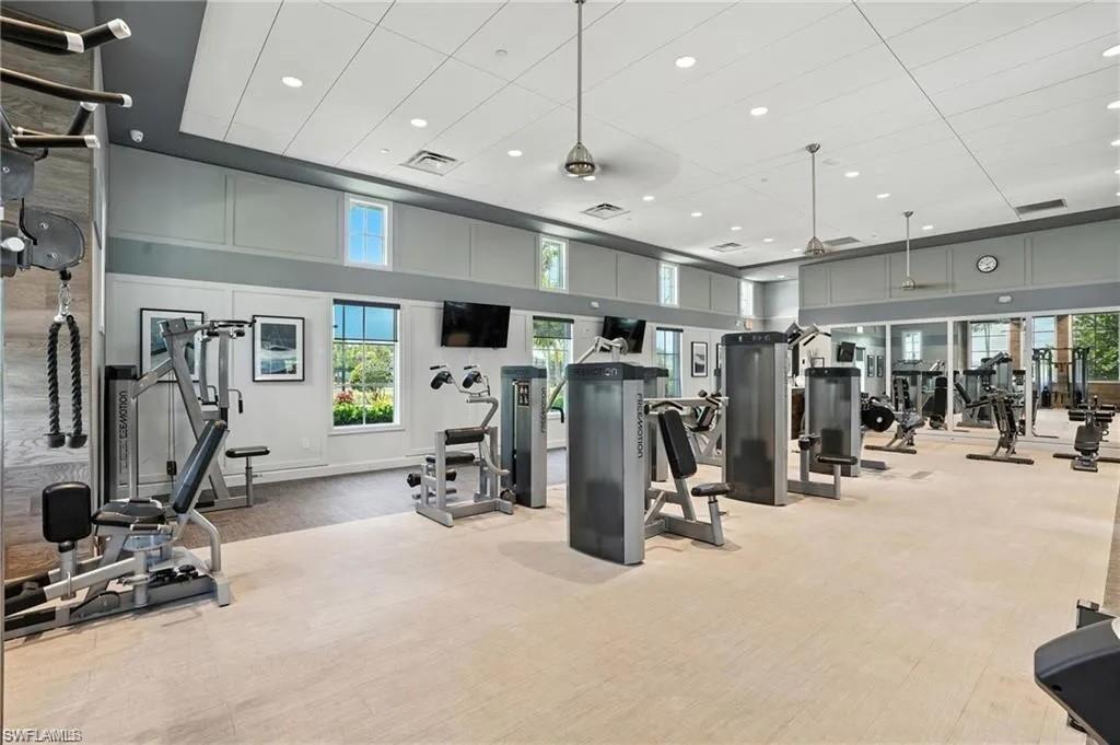 9175 Cayman Drive Naples, FL 34114 - Photo 20 of 31 a view of a room with gym equipment