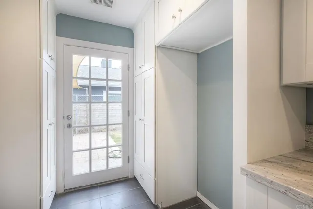 a view of an empty room and window