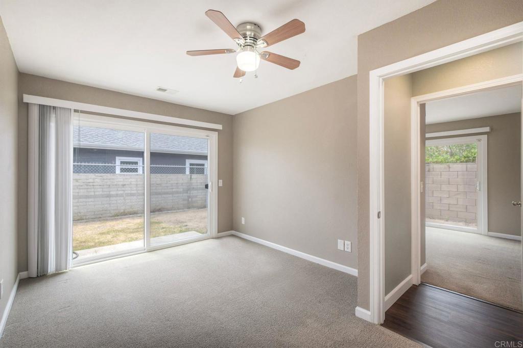 769 Magnolia Avenue, Unit B Carlsbad, CA 92008 - Photo 13 of 25 an empty room with windows and closet