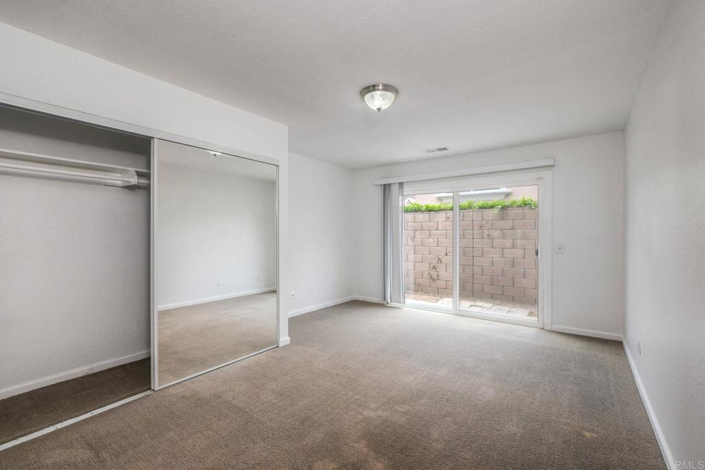 769 Magnolia Avenue, Unit B Carlsbad, CA 92008 - Photo 19 of 25 a view of an empty room with a window