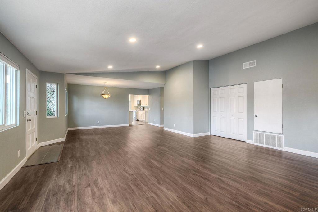 769 Magnolia Avenue, Unit B Carlsbad, CA 92008 - Photo 4 of 25 a view of empty room with wooden floor