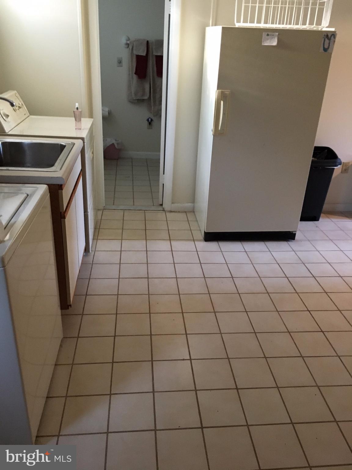 10609 Gorman Road Laurel, MD 20723 - Photo 23 of 28 l)large laundry room w/lots of cabinets (not shown