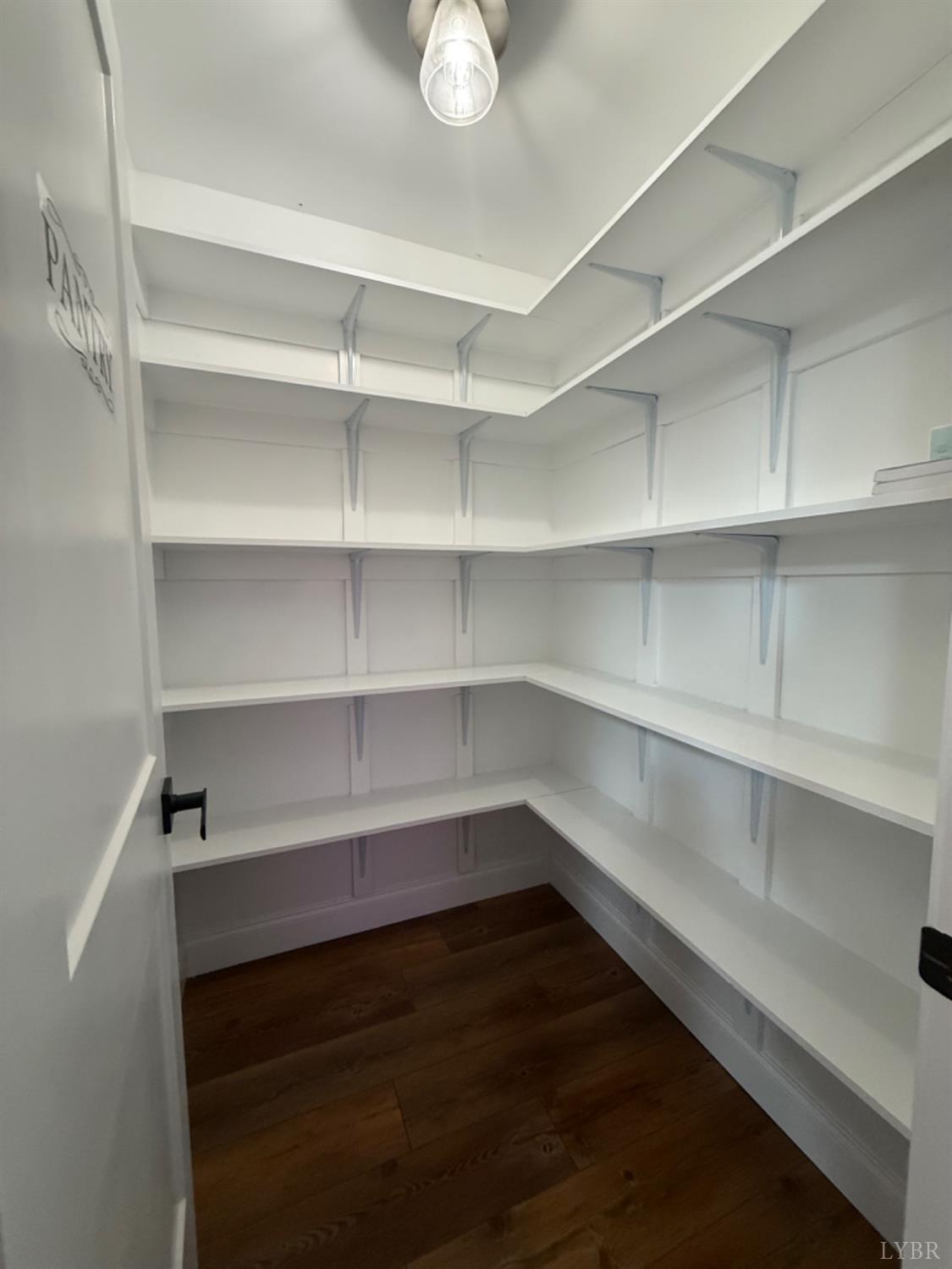 129 Ned Brown Road Amherst, VA 24521 - Photo 12 of 30 a view of walk in closet with empty racks