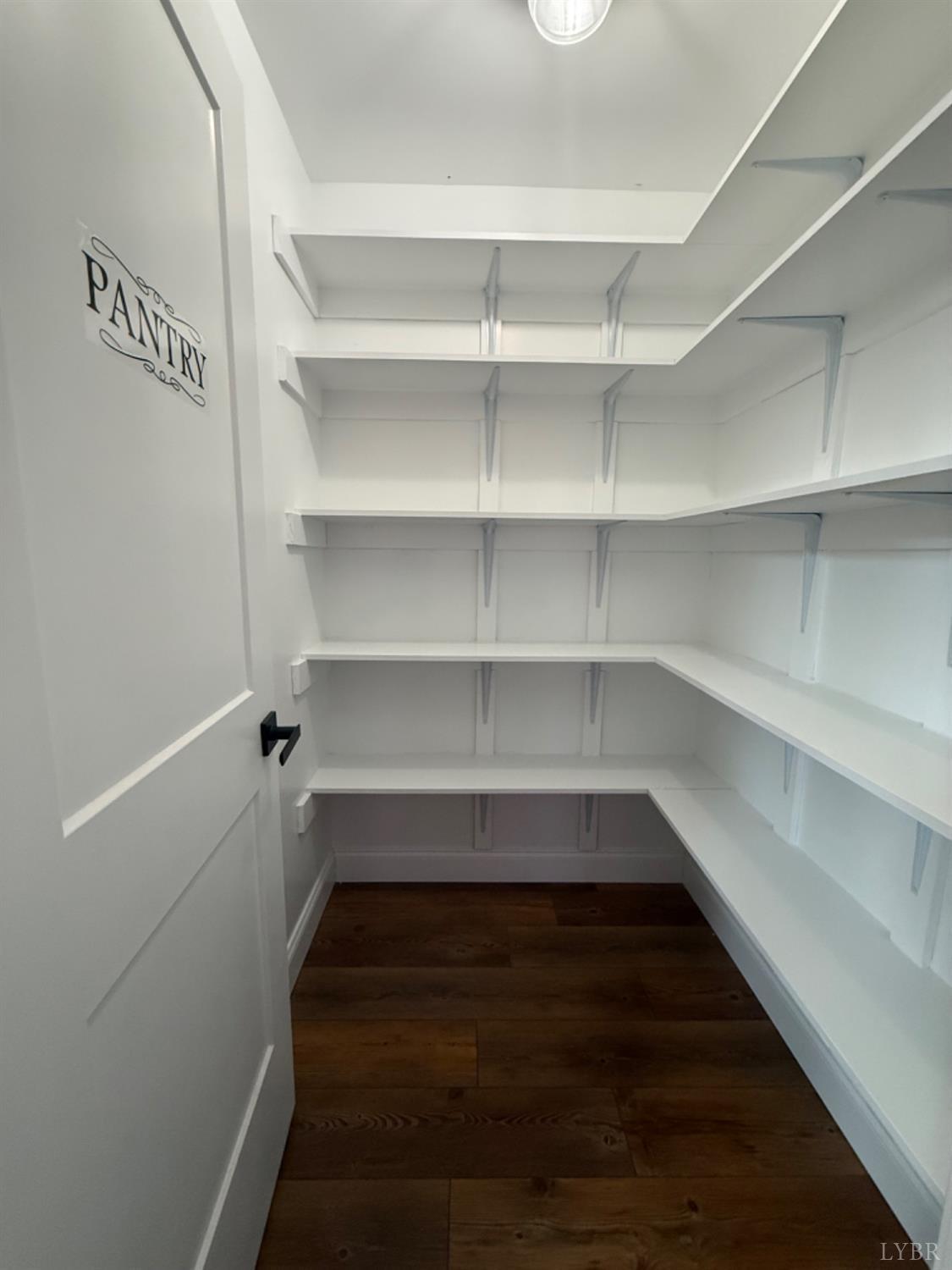 129 Ned Brown Road Amherst, VA 24521 - Photo 13 of 30 a view of walk in closet with empty racks