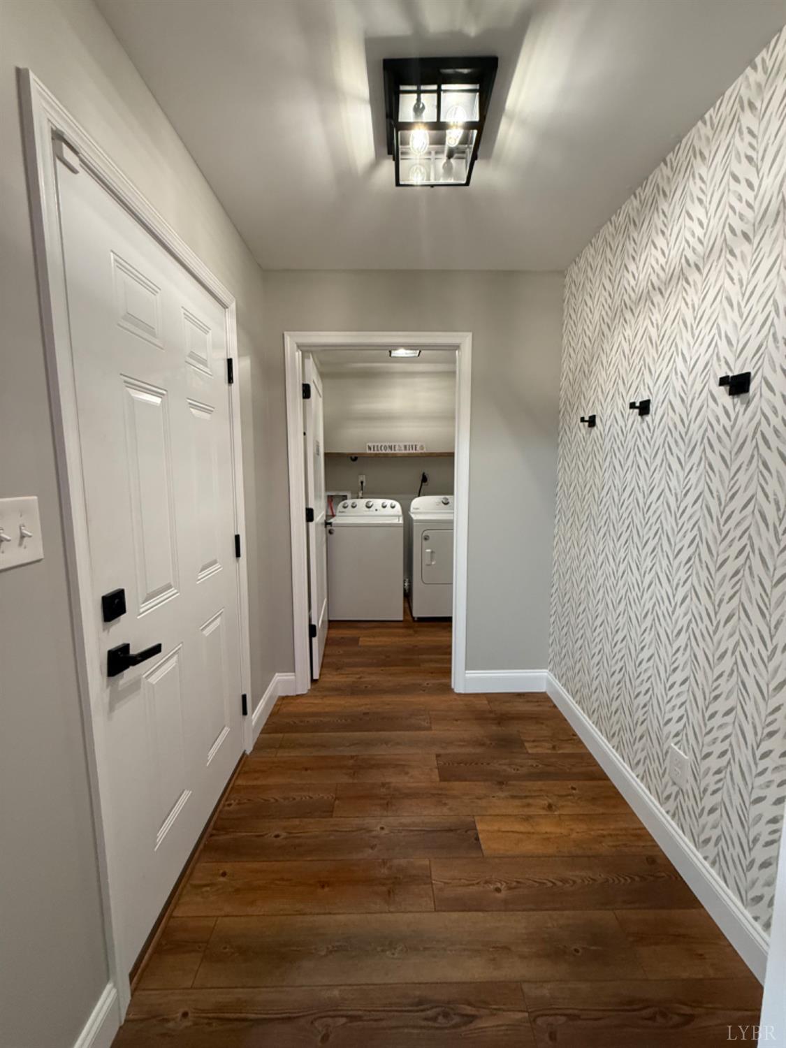 129 Ned Brown Road Amherst, VA 24521 - Photo 14 of 30 a view of a hallway view with wooden floor and staircase