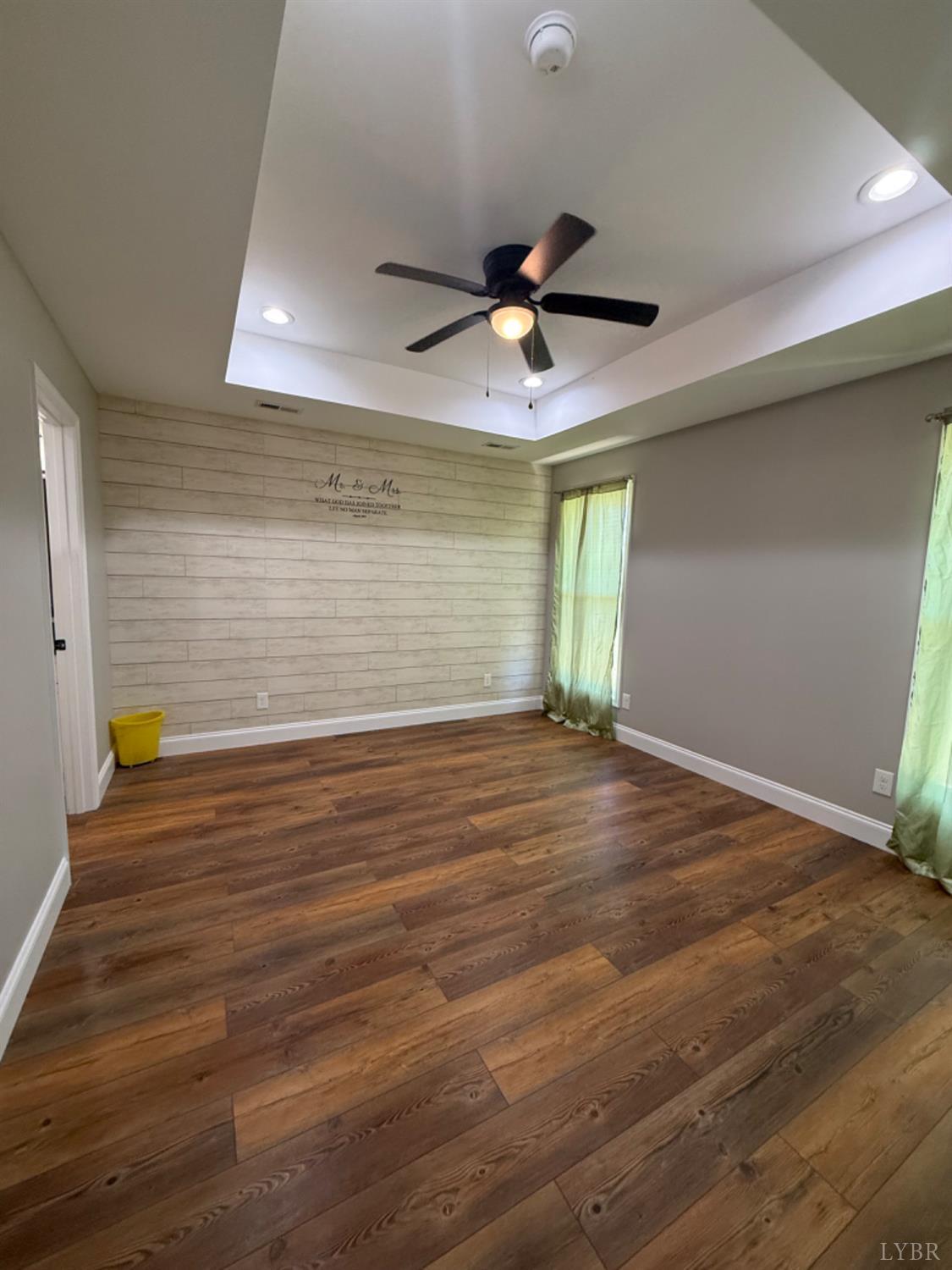 129 Ned Brown Road Amherst, VA 24521 - Photo 17 of 30 a view of empty room with wooden floor