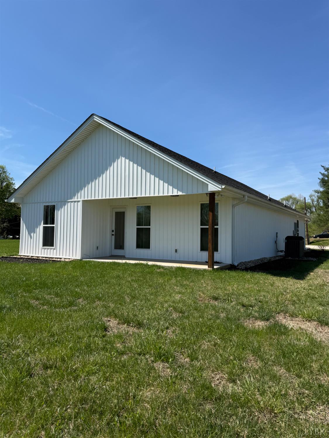 129 Ned Brown Road Amherst, VA 24521 - Photo 26 of 30 a front view of house with backyard and green space