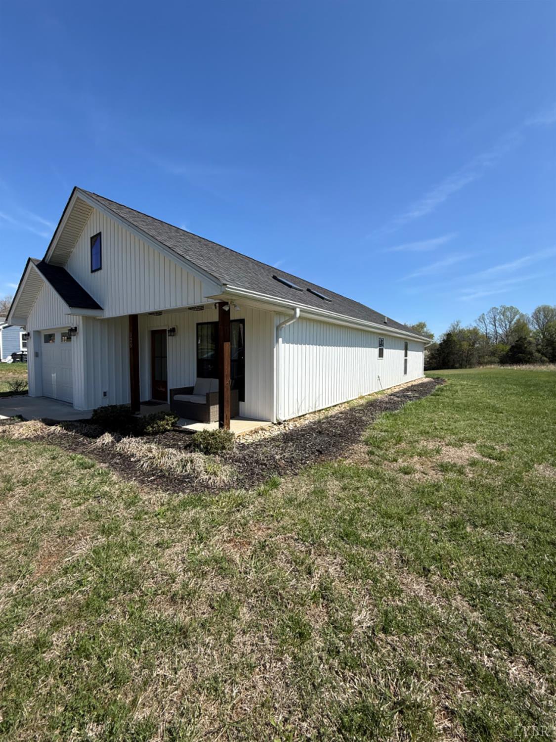 129 Ned Brown Road Amherst, VA 24521 - Photo 3 of 30 a front view of a house with a yard