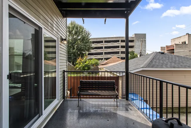 a kitchen with stainless steel appliances granite countertop a stove a sink dishwasher and a refrigerator with wooden cabinets