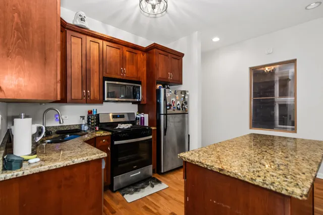 a view of a livingroom with a furniture