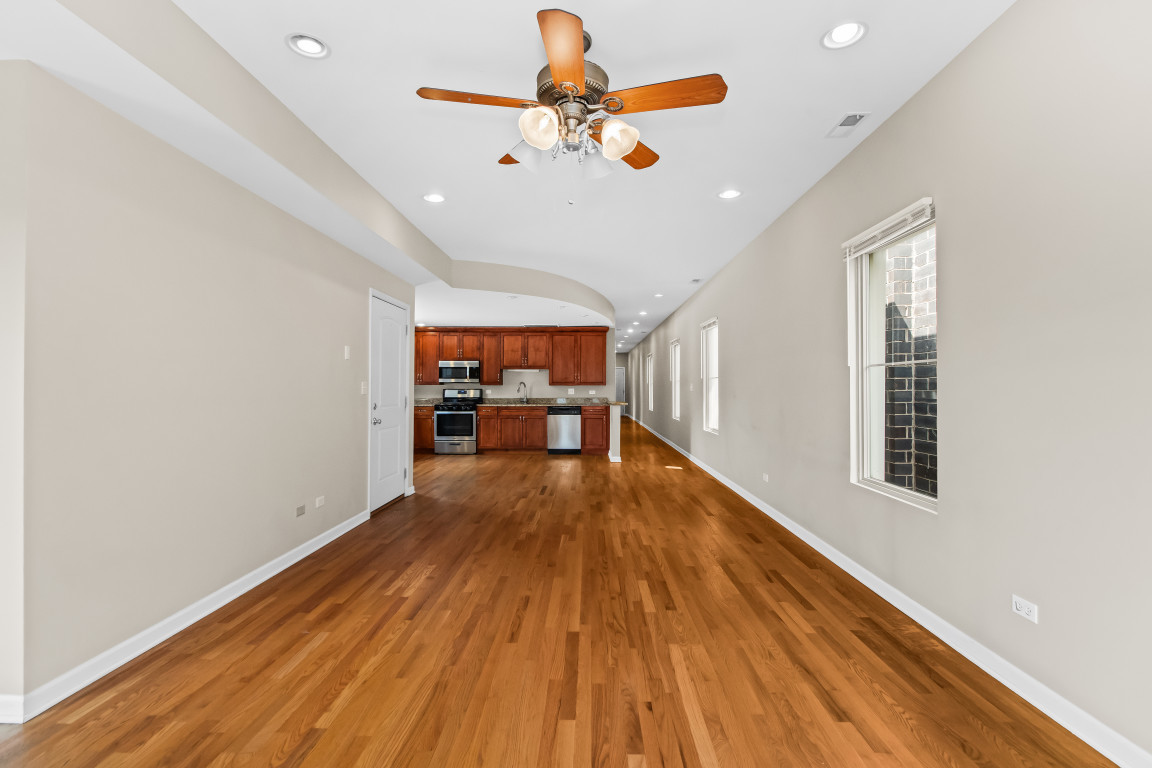 2710 North Artesian Avenue Chicago, IL 60647 - Photo 29 of 61 a view of empty room with wooden floor