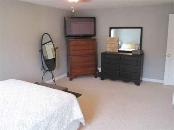 9 Pearlbush Path Worcester, MA 01607 - Photo 12 of 28 a bedroom with a bed and a mirror on dresser