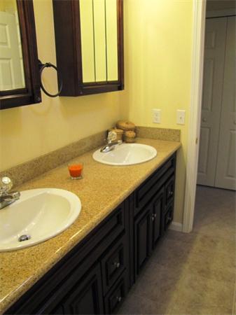 9 Pearlbush Path Worcester, MA 01607 - Photo 14 of 28 a bathroom with a granite countertop sink and a mirror