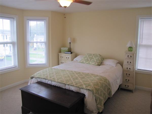 9 Pearlbush Path Worcester, MA 01607 - Photo 9 of 28 a bedroom with a bed and a window