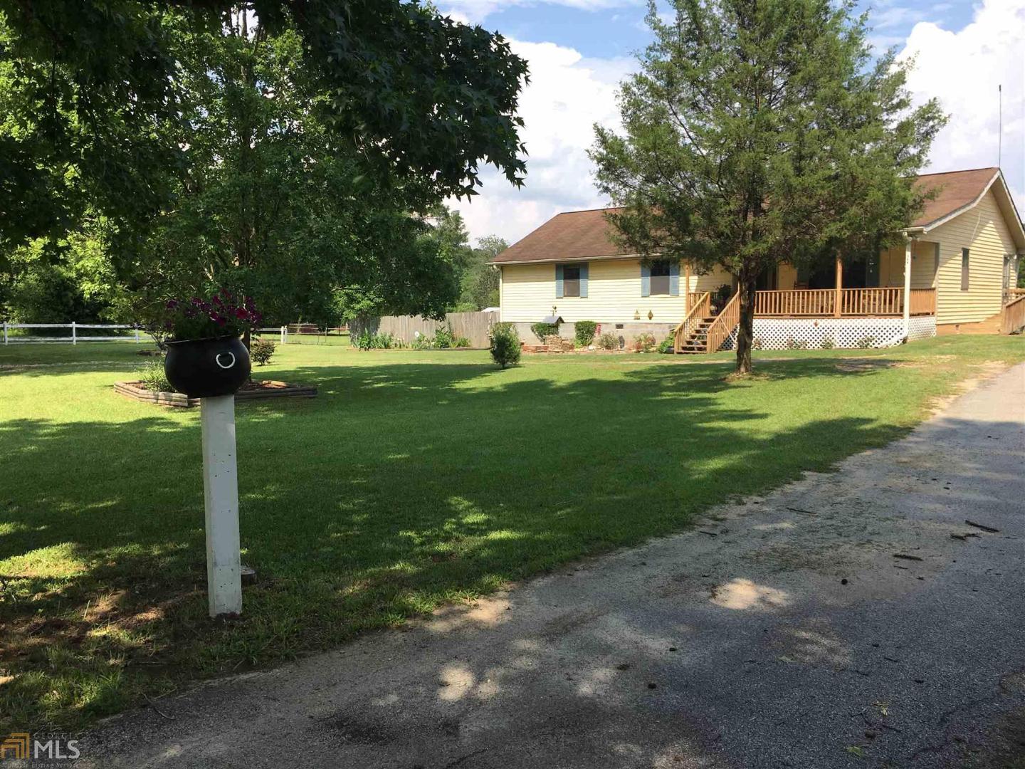 11364 Turner Road Hampton, GA 30228 - Photo 1 of 1 a front view of a house with garden
