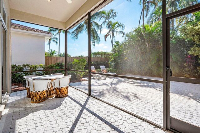 a view of a porch with a backyard
