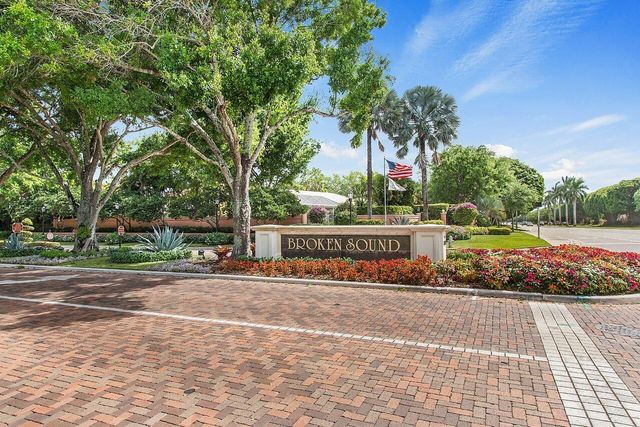 a view of street with cars parked