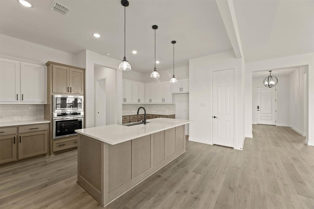 124 Evanston Court Rhome, TX 76078 - Photo 11 of 28 124 Evanston-Kitchen-2