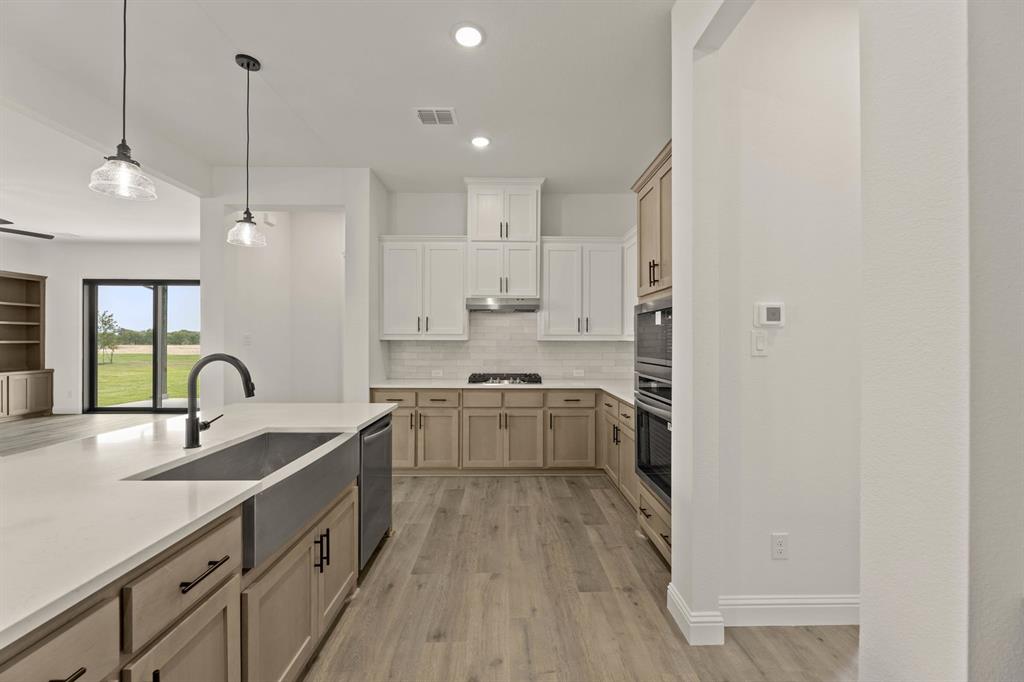 124 Evanston Court Rhome, TX 76078 - Photo 12 of 28 124 Evanston-Kitchen-3