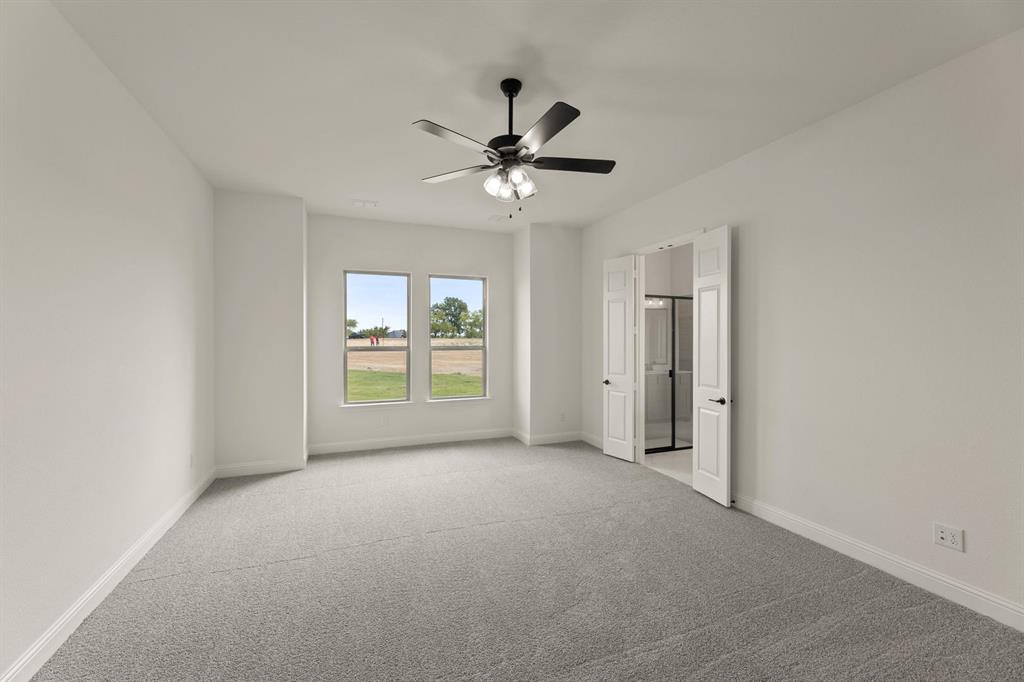 124 Evanston Court Rhome, TX 76078 - Photo 14 of 28 124 Evanston-Primary Suite-1